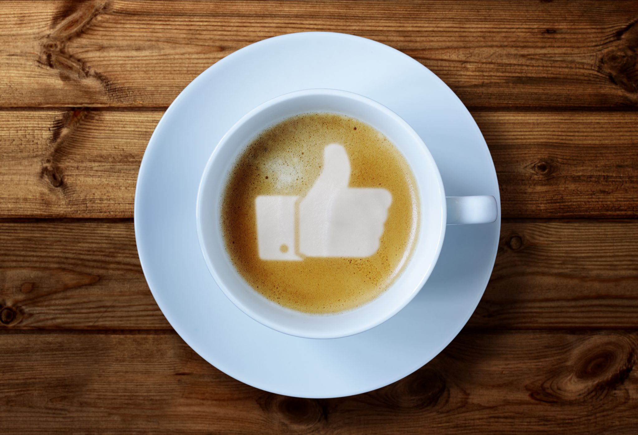 Facebook Thumbs up sign in coffee froth
